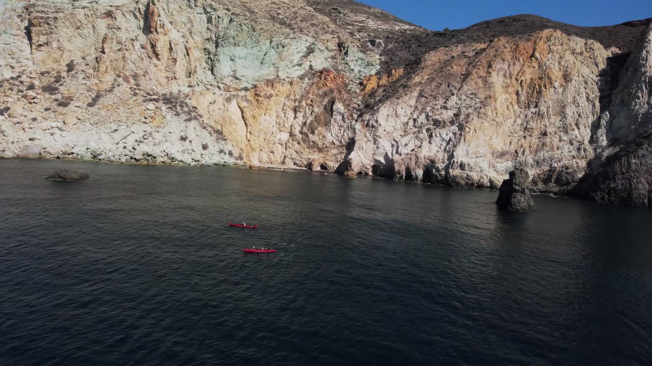Aerial view of kayaks near cliffs