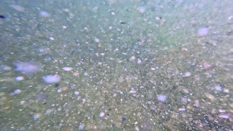 bubbles swirling through the water, moving with the waves, uruguay