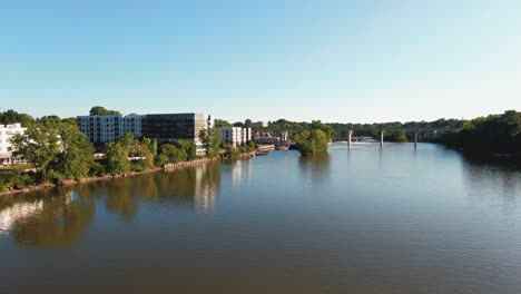 Aerial Establishing Shot of Fox River with Cars Traveling on Bridge Appleton, Wisconsin