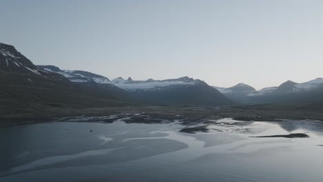 flying over the lake to faskrudsfjordur airport in eastern iceland