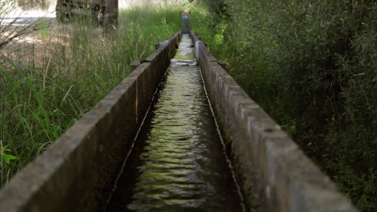 Water Flowing In An Irrigation Canal