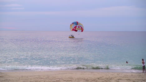 parasail on stand-by surrounded by a very calm sea