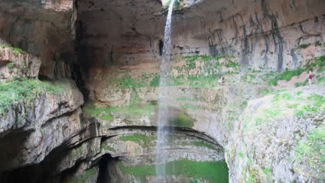 High-waterfall-drop-in-Balue-Balaa-sinkhole-location,-camera-tilt-down-view