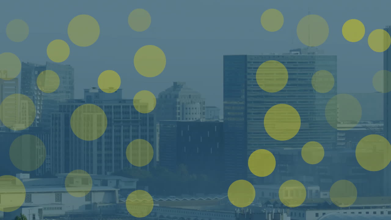 도시 풍경 위에 떠다니는 반이는 반점들의 애니메이션