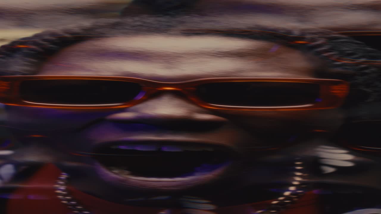 Emotional African American Man in Sunglasses Yelling at Camera