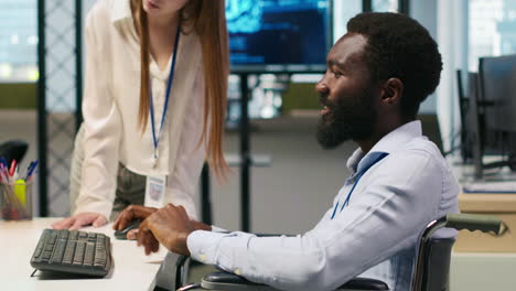 junior dev and coworker in wheelchair developing ai software applications
