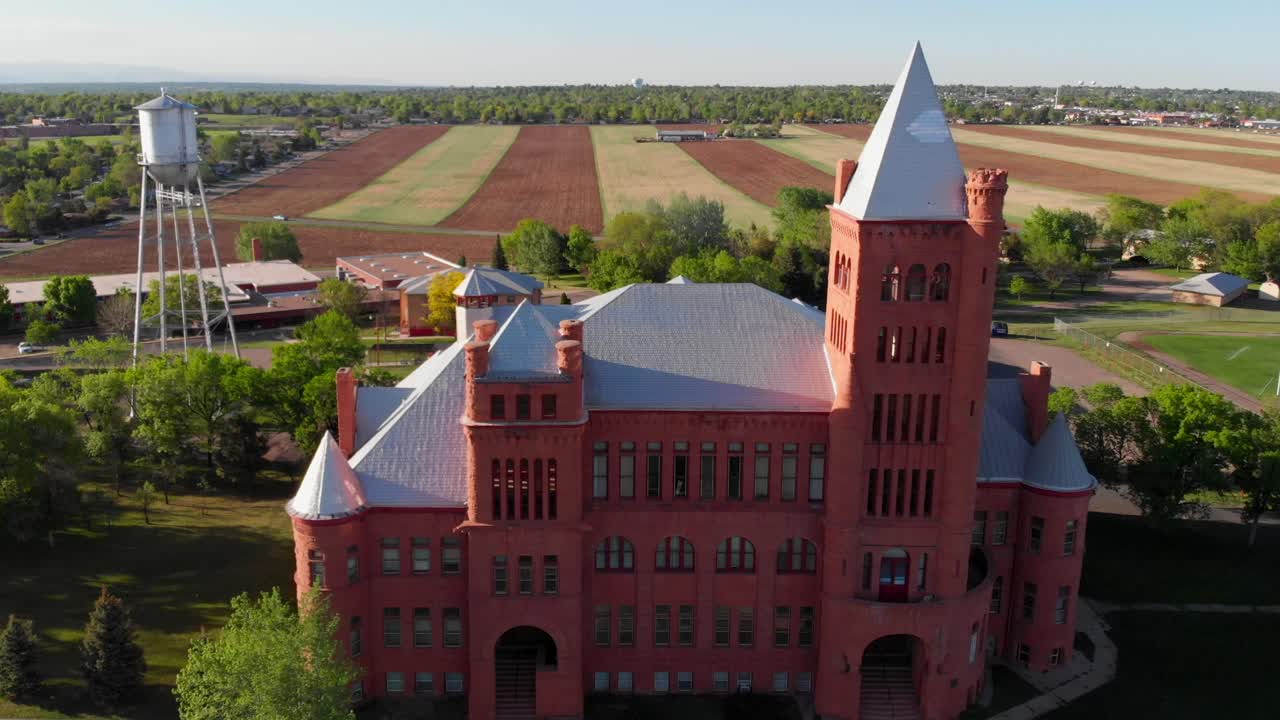 Aerial front view of castle on nice day