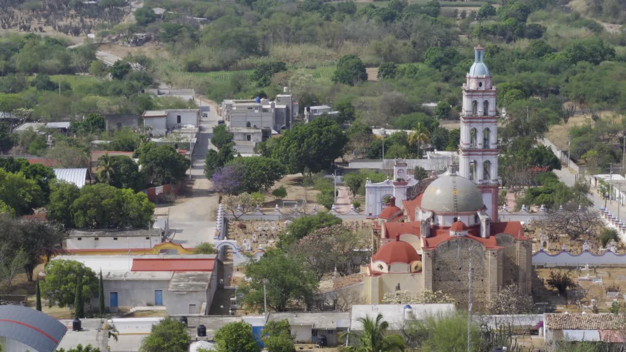 High angle shot of plants and hills on a sunny day in Mixteca Poblana, Puebla, Mexico