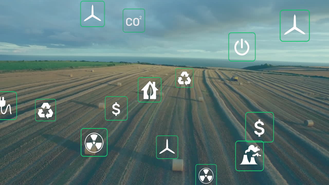 Wind turbine icon floating over cut field, showing recycling, power and eco icons in flat design