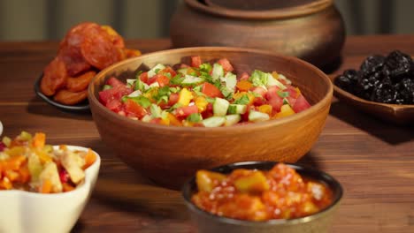 moroccan cuisine. traditional dishes, vegetable salad. middle eastern culture. homemade food. bowls with sauces and cold appetizer.