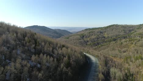 aerial view of a winding mountain road