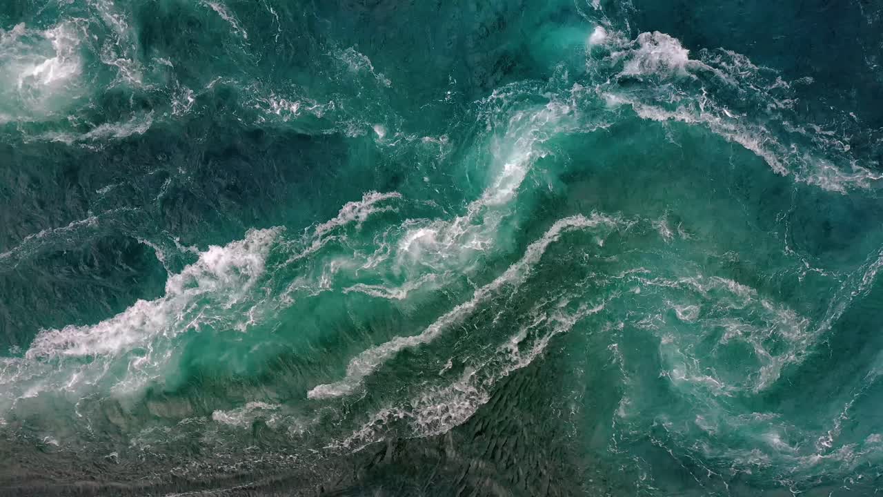 Waves of water of the river and the sea meet each other during high tide and low tide.