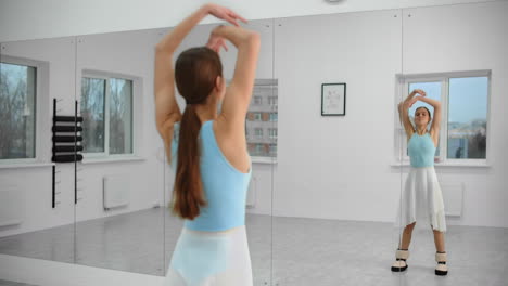 ballet dancer stretching and practicing