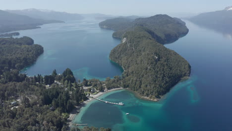 Aerial---Nahuel-Huapi-Lake-In-Arrayanes-National-Park,-Villa-La-Angostura,-Neuquen,-Argentina,-Backwards