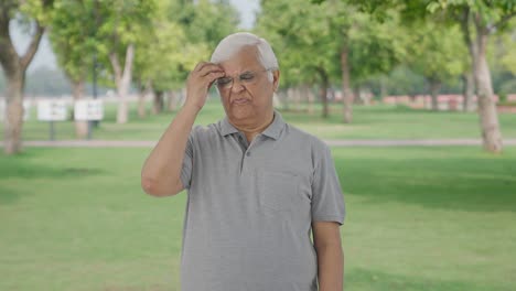 Stressed-and-tensed-Indian-old-man-in-park