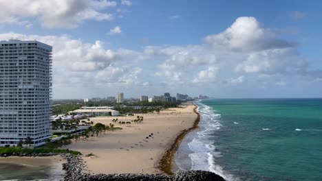 fort lauderdale, florida beach and hotels on sunny day, leaving port