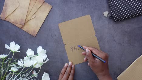 writing a thank you card