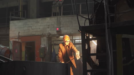 metal worker in industrial setting