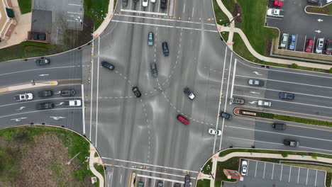 confusing multilane traffic intersection with cars crossing lanes