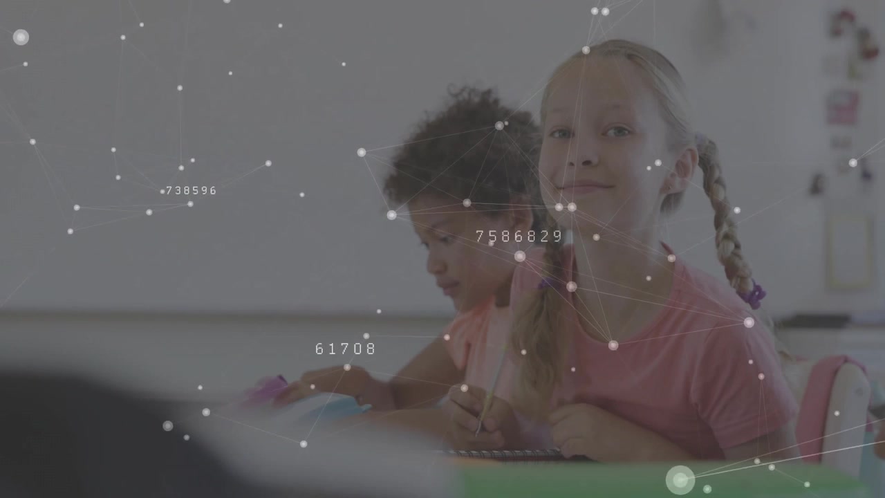 Front student noticing camera shift by pausing writing to smile under animated education overlay