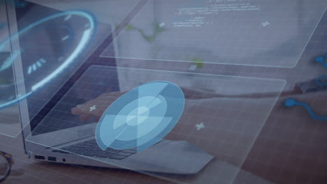 Futuristic digital interface animation over person using laptop at desk