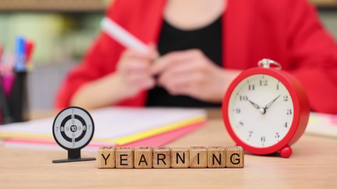 Yearning, time, and targets on a desk