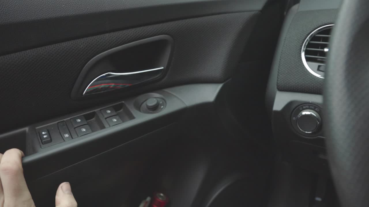 Driver Opening The Car Door By Pulling The Door Handle Inside - Closeup Shot