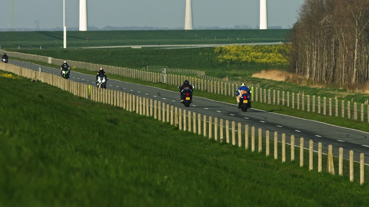 A slow-motion video of a racer participating in a street race