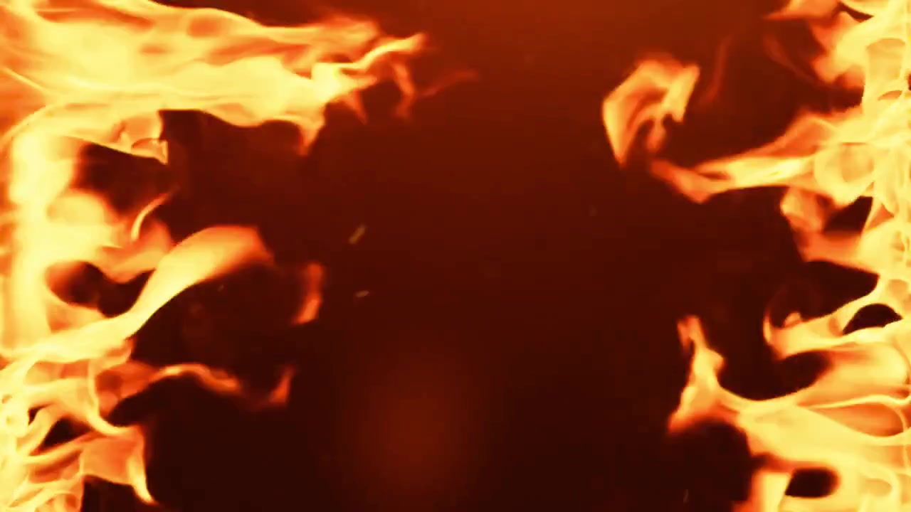 Flakkende ildflammer, der danner en ramme på en mørk baggrund