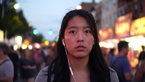 teenage girl at a night market