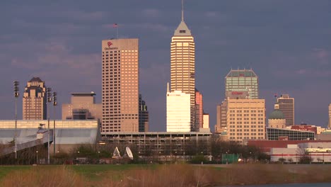 the city of indianapolis at dusk along the white river 1