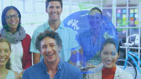 animation of globe and data processing over smiling business colleagues in office