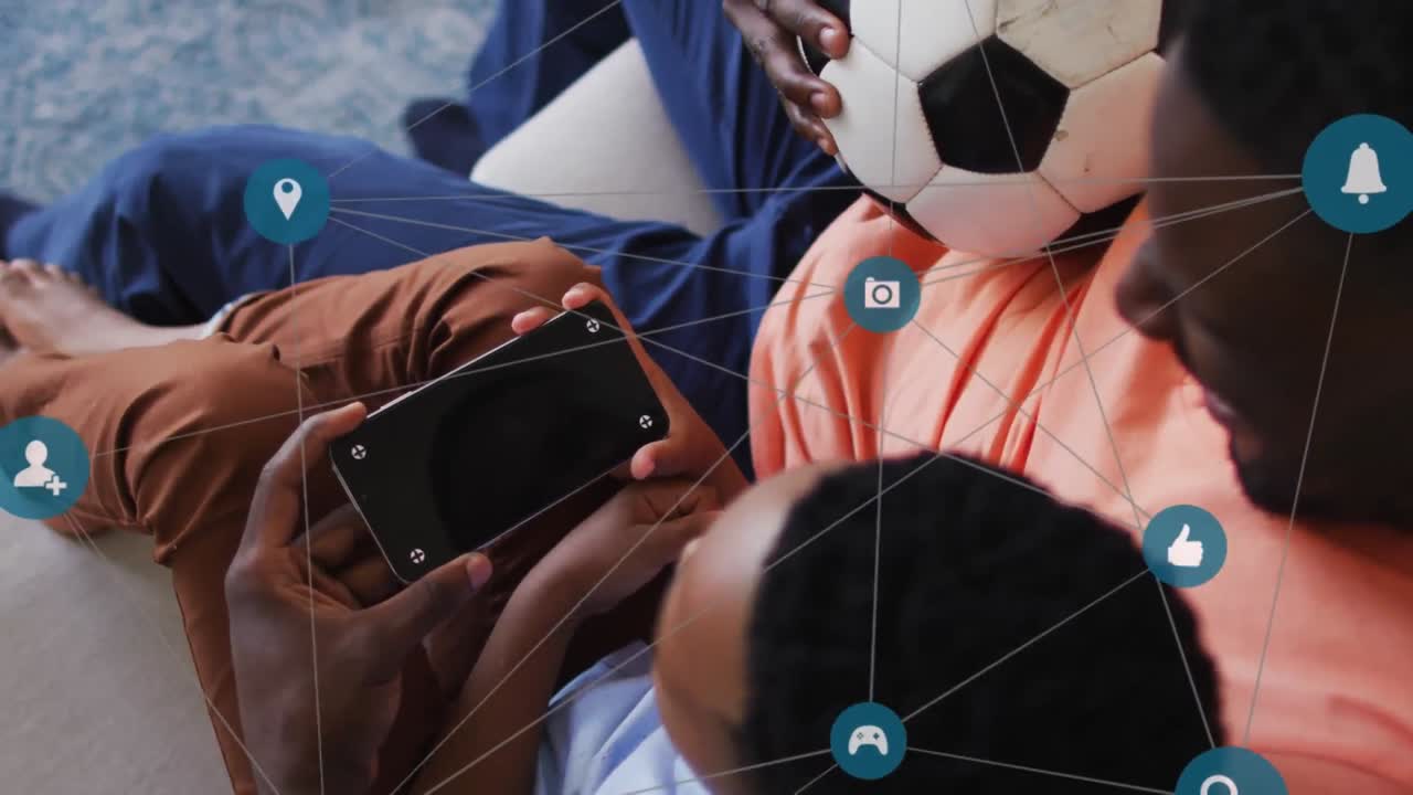 아프리카계 미국인 아버지와 아들이 스마트폰을 사용하여 복사 공간을 사용하는 연결의 애니메이션