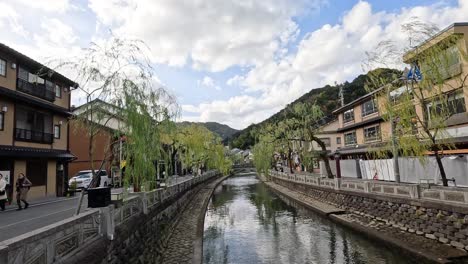 a time-lapse of a picturesque riverside town.