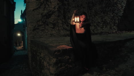 woman with lantern reads a book at night on the streets of the mysterious city