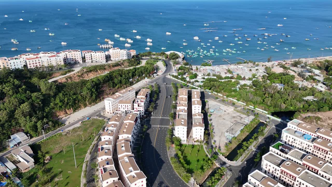 Aerial footage of Phu Quoc Island highlighting the Sun Grand City Hillside Residence project centerpiece of Sunset Town a picturesque town distinguished by its beautiful Mediterranean architecture