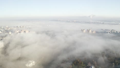 drone shot of chisinau, moldova covered by fog, dust, and air pollution