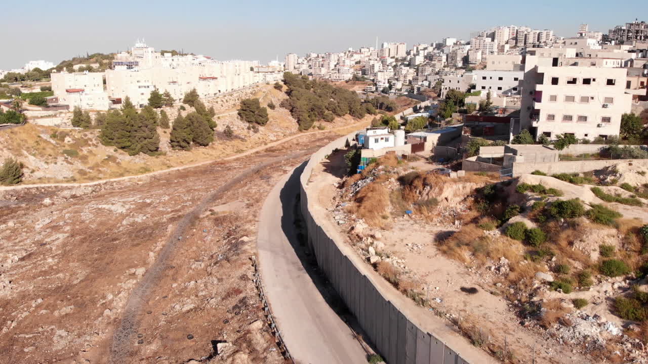 Flying close to Burnt security fence in Jerusalem