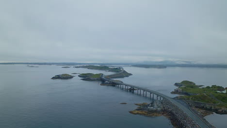 Panoramic-Aerial-View-Of-Atlantic-Ocean-Road-With-Overcast-Sky-In-Norway