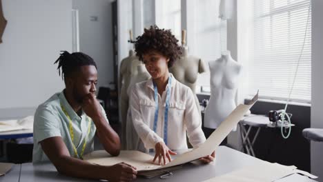 two colleagues working in fashion office