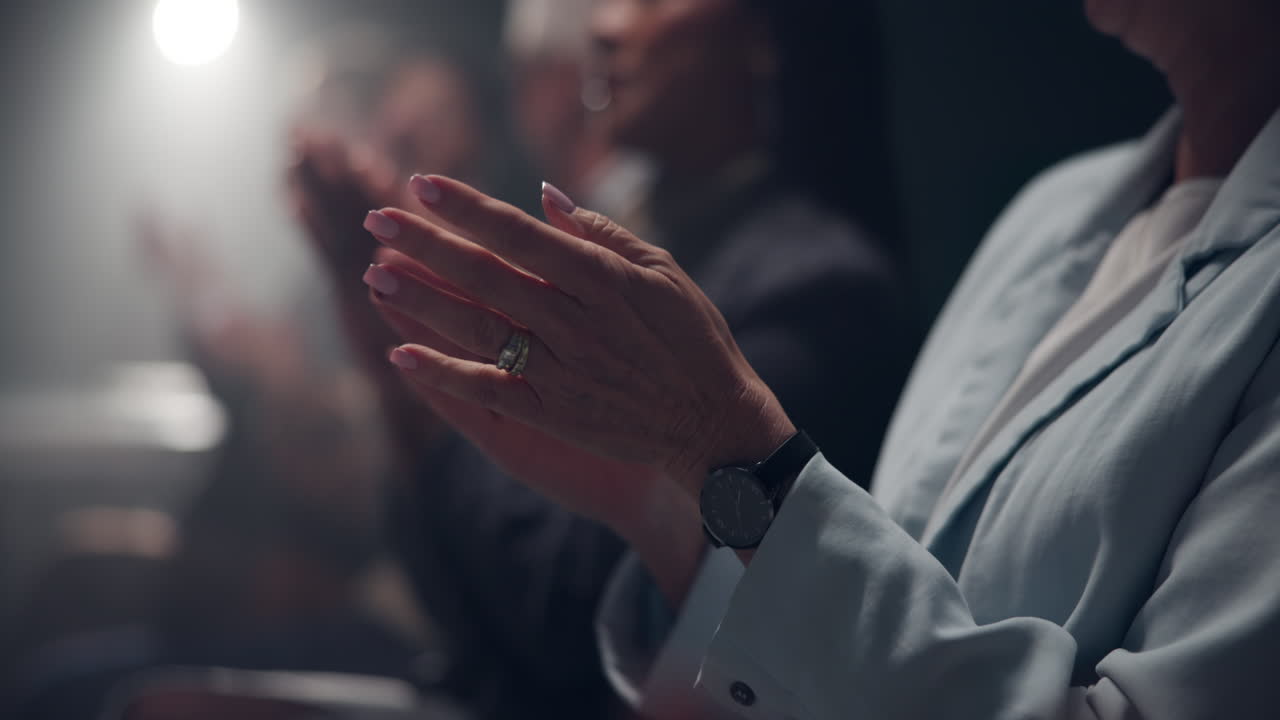 Audience applauding at a business event