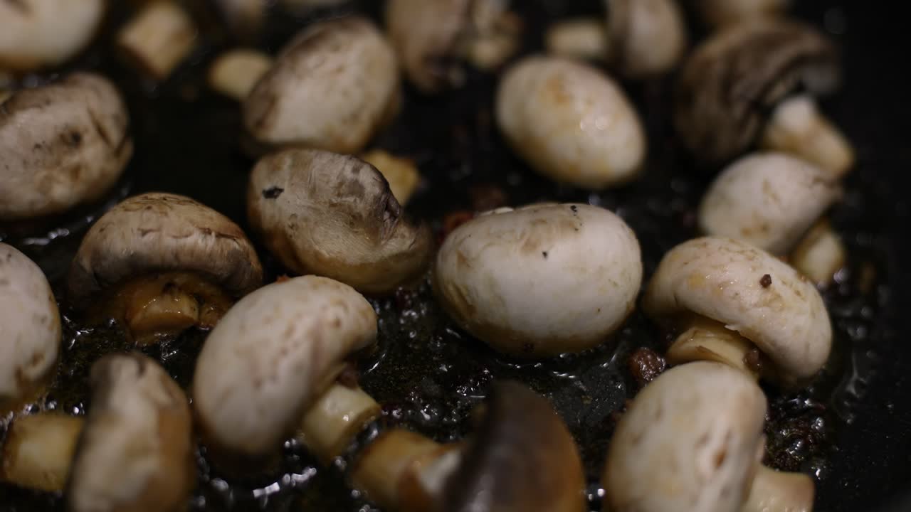 Mushrooms being cooked