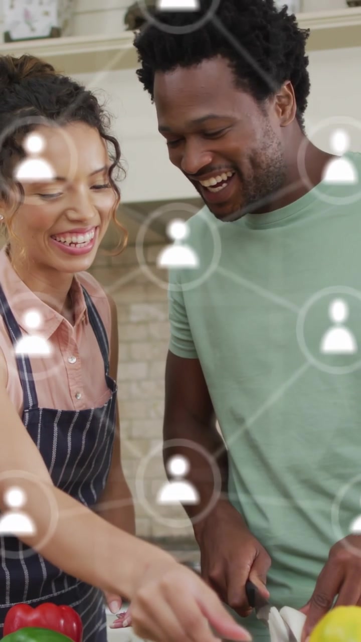 Vertical video: Woman handing item man cutting with knife UI overlaying fading pair smiling cooking