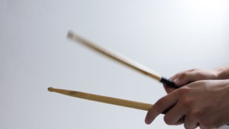 drum-stick-click-count-in-against-white-background