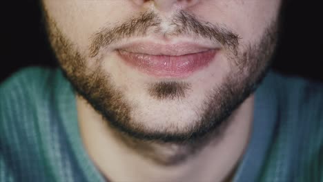 close-up of a man's face and mouth