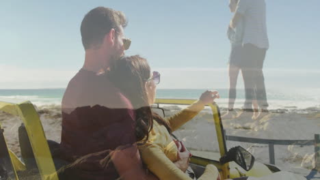 in car, couple viewing beach with animation of romantic couple overlay