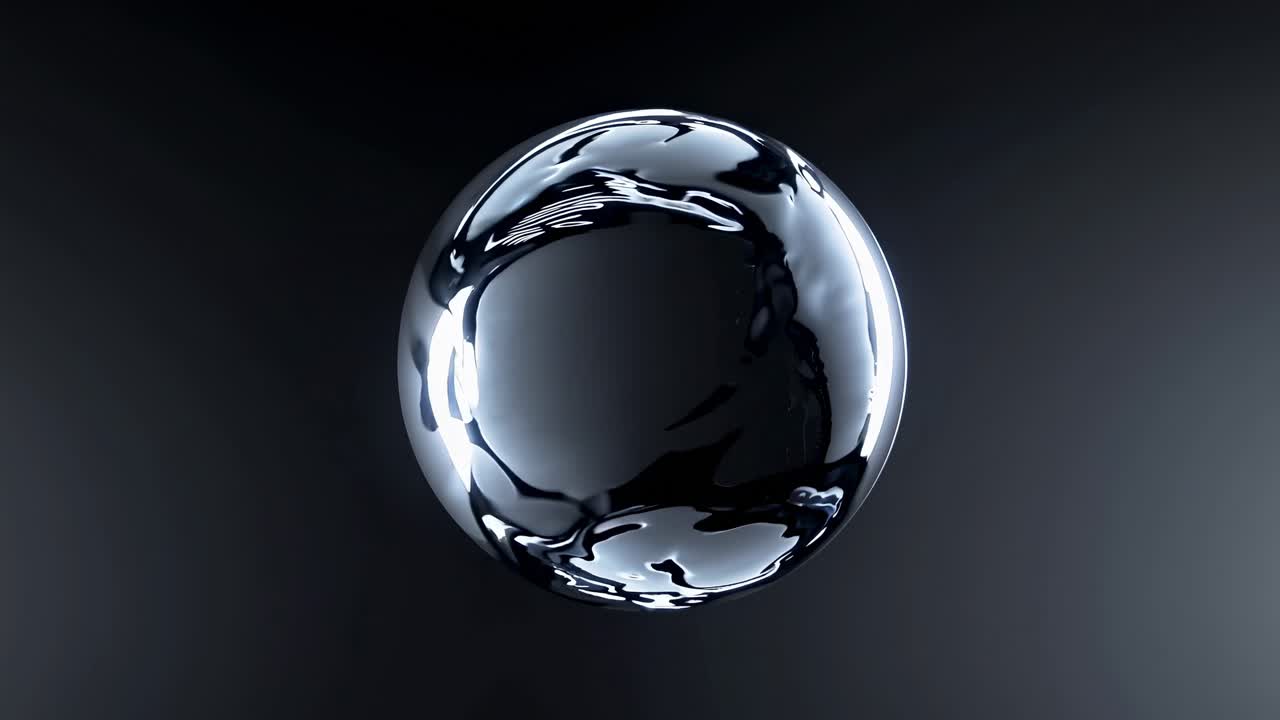 A sleek, reflective metallic sphere floating in a dark space, captured from a centered angle