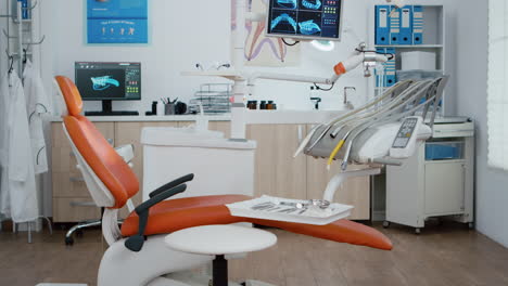 interior of modern equipped dental office with x ray on monitors