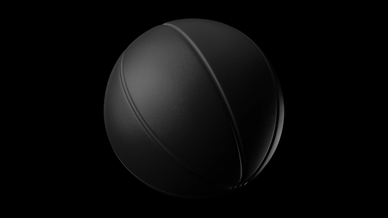 Black basketball ball on black background.
