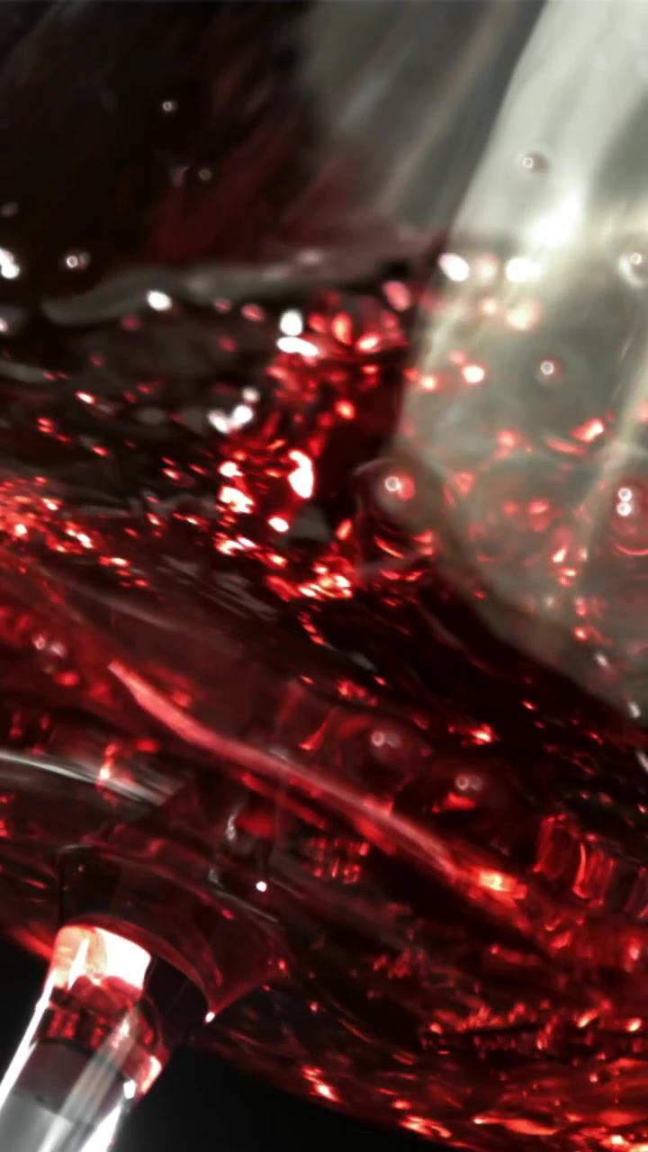 Liquido rosso astratto con bolle e riflessi di luce scintillanti